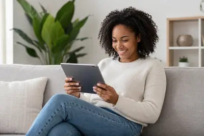 Woman reviewing cash offer on tablet
